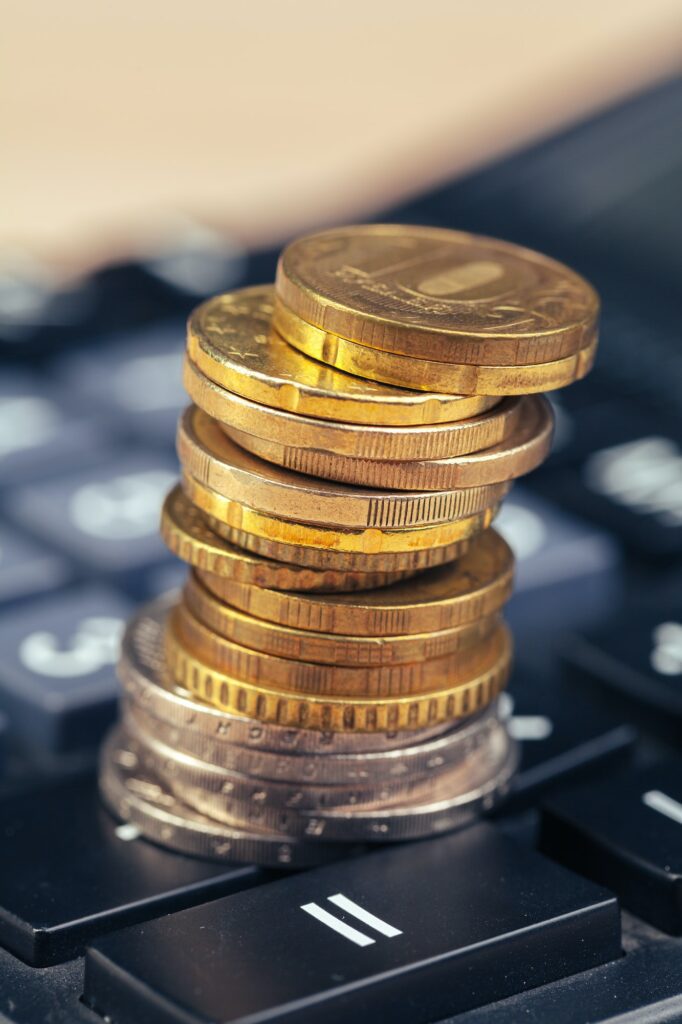 stack of coins and calculator,concept idea for business finance